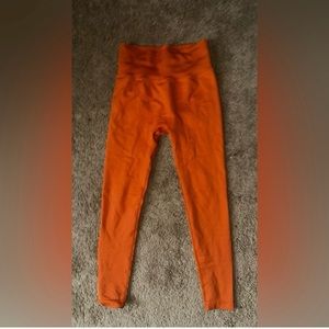 Naturyl Womens size Medium Niykee Leggings Butt Scrunch High Waist in Orange